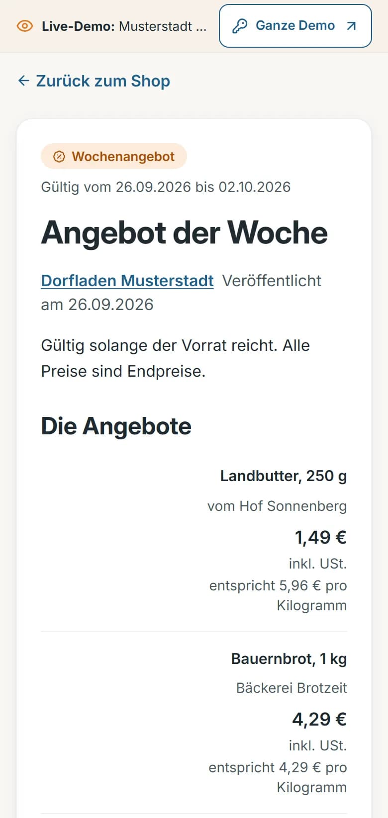 Wochenangebot des Dorfladens Musterstadt in der Demo-Gemeinde: Kennzeichnung „Wochenangebot“, Gültigkeitszeitraum, Titel „Angebot der Woche“ und Angebotszeilen wie „Landbutter, 250 g“ mit Endpreis, Umsatzsteuerhinweis und Grundpreis je Kilogramm